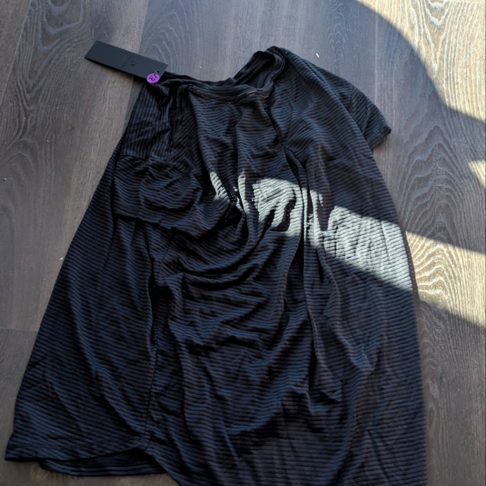 It's a black see-through mesh shirt